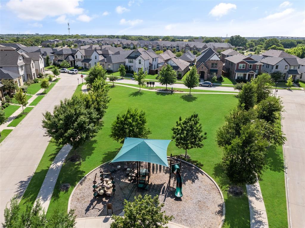 4881 Miles Way Fairview, TX 75069 - Photo 39 of 39 an aerial view of a house with garden space and lake view