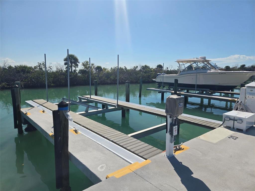 5820 Gasparilla Road, Unit SLIP 25 Boca Grande, FL 33921 - Photo 4 of 24 a view of a swimming pool