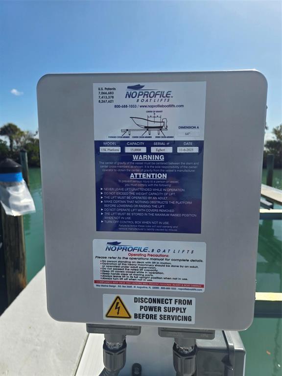 5820 Gasparilla Road, Unit SLIP 25 Boca Grande, FL 33921 - Photo 5 of 24 a view of a bench in kitchen