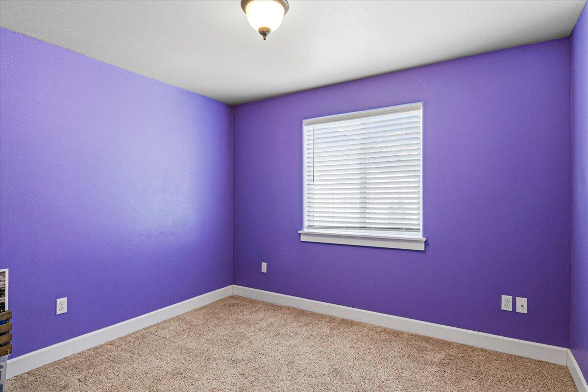 1339 Southwest Rimrock Way Redmond, OR 97756 - Photo 14 of 26 an empty room with a window