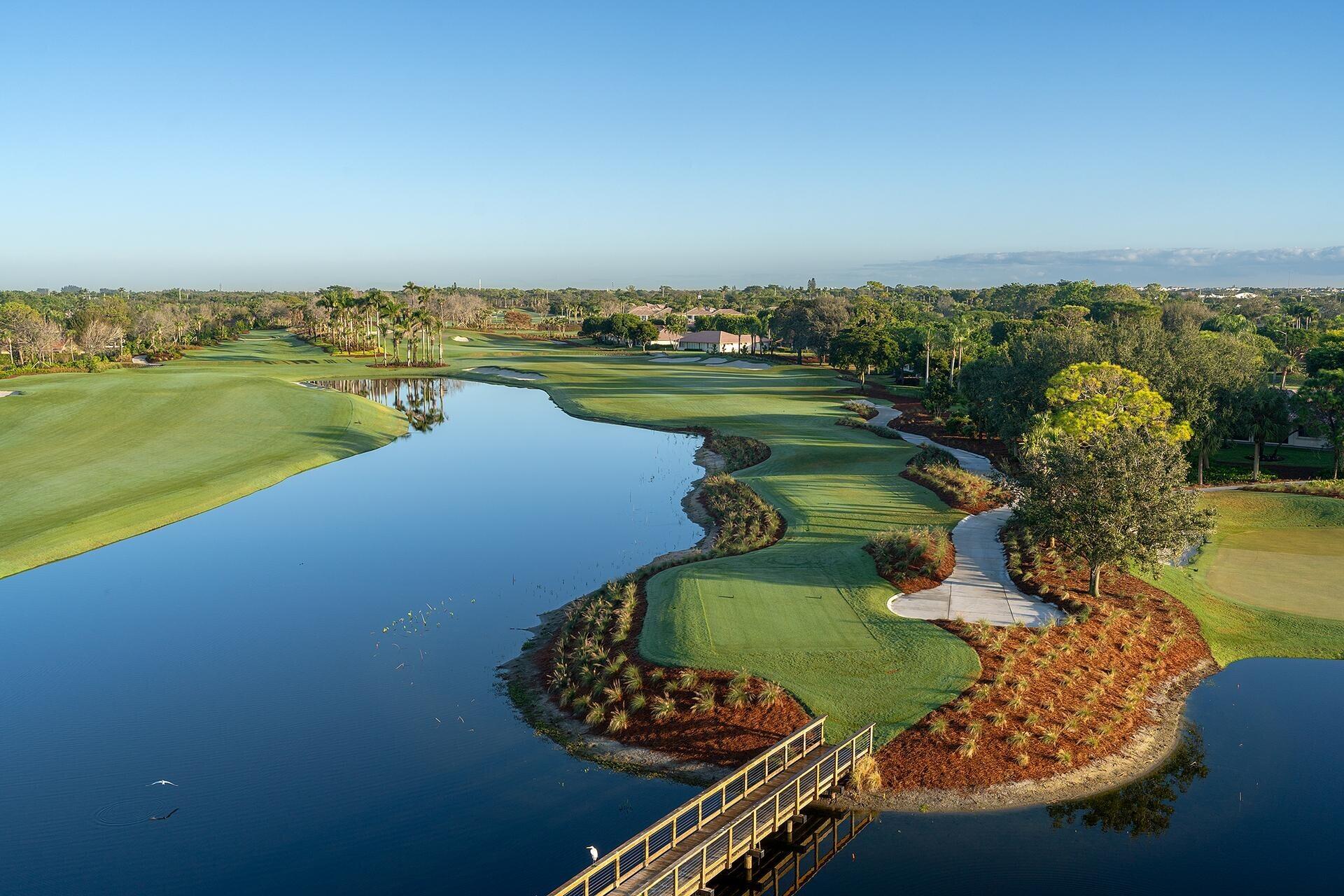10171 Quail Covey Road, Unit HIBISCUS N Boynton Beach, FL 33436 - Photo 50 of 50 a view of a lake with a outdoor space