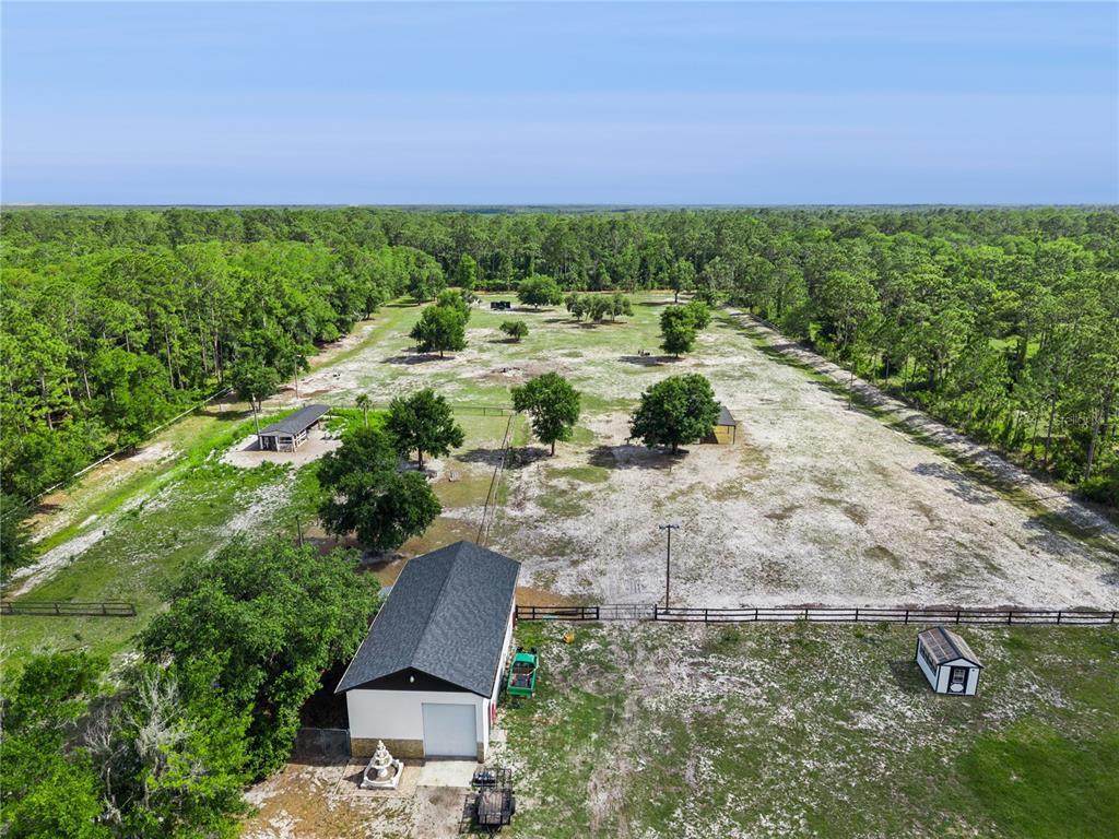 345 Cypress Isles Road Osteen, FL 32764 - Photo 41 of 41 a view of a garden with a yard