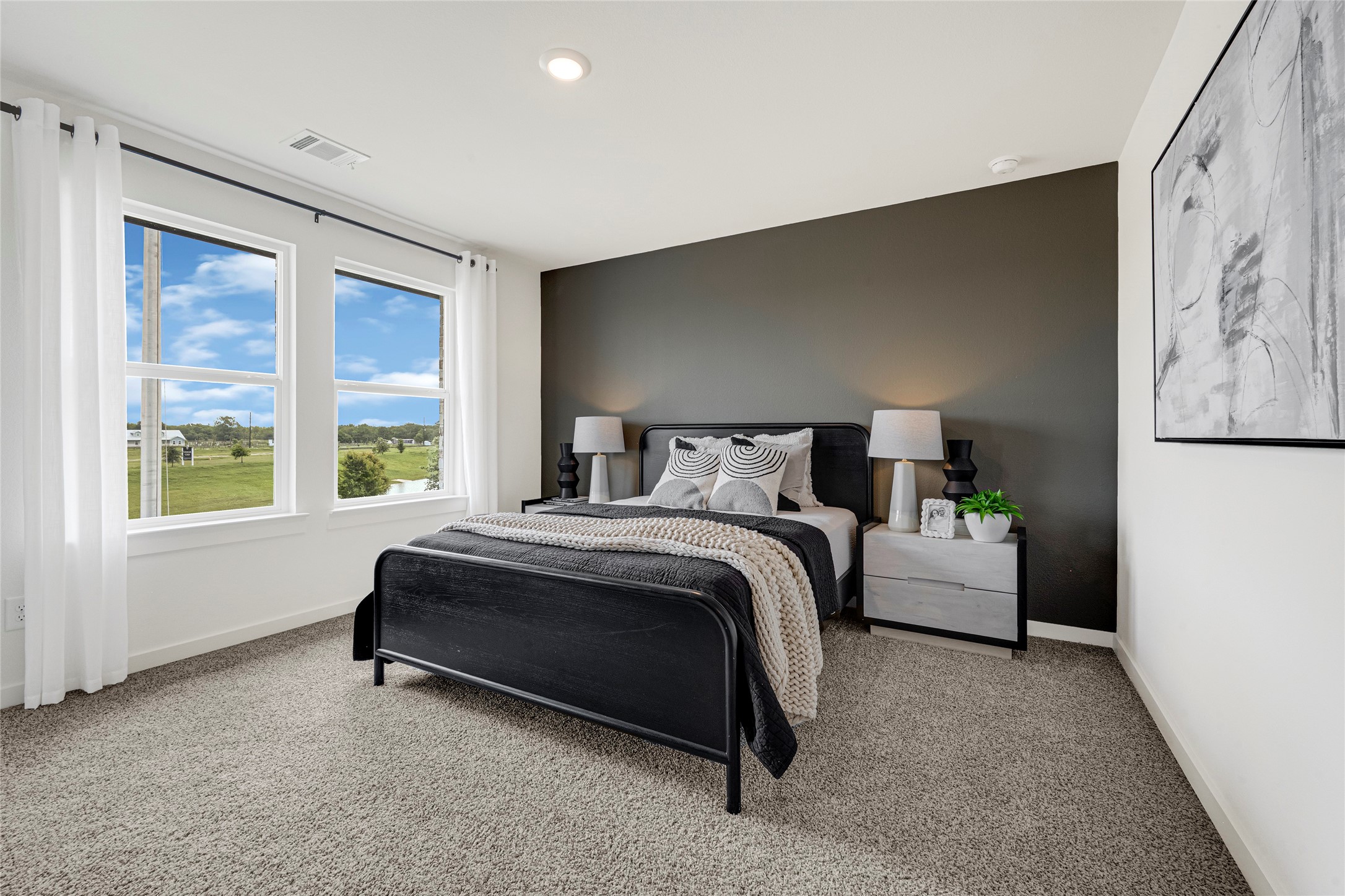 6204 Brookhaven Street Rosenberg, TX 77469 - Photo 21 of 33 a bedroom with a bed and a large window