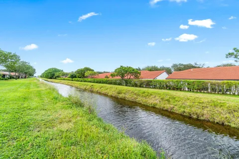 a view of a lake with a big yard