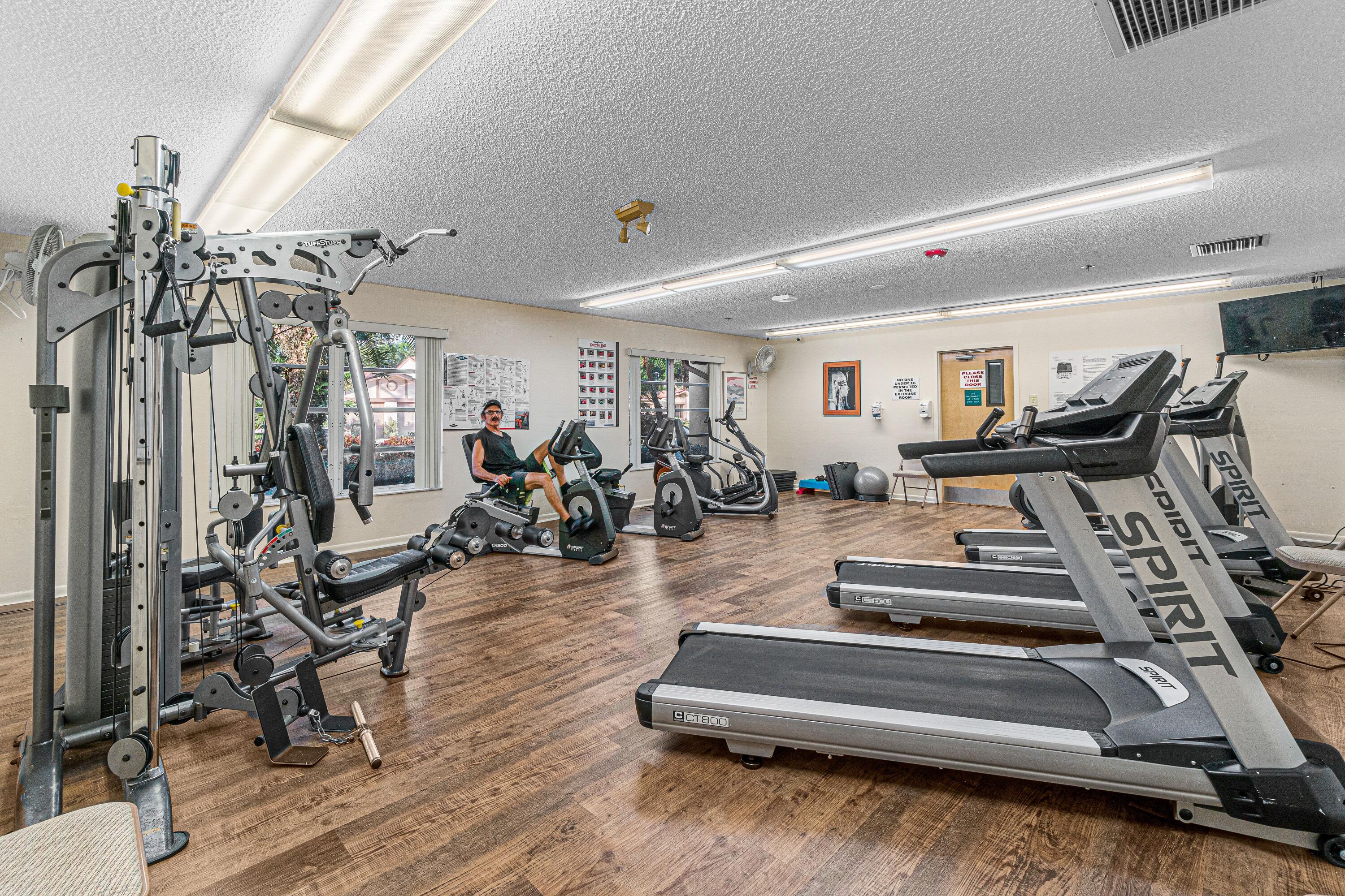 8191 Whispering Palm Drive Boca Raton, FL 33496 - Photo 34 of 34 a view of a room with gym equipment