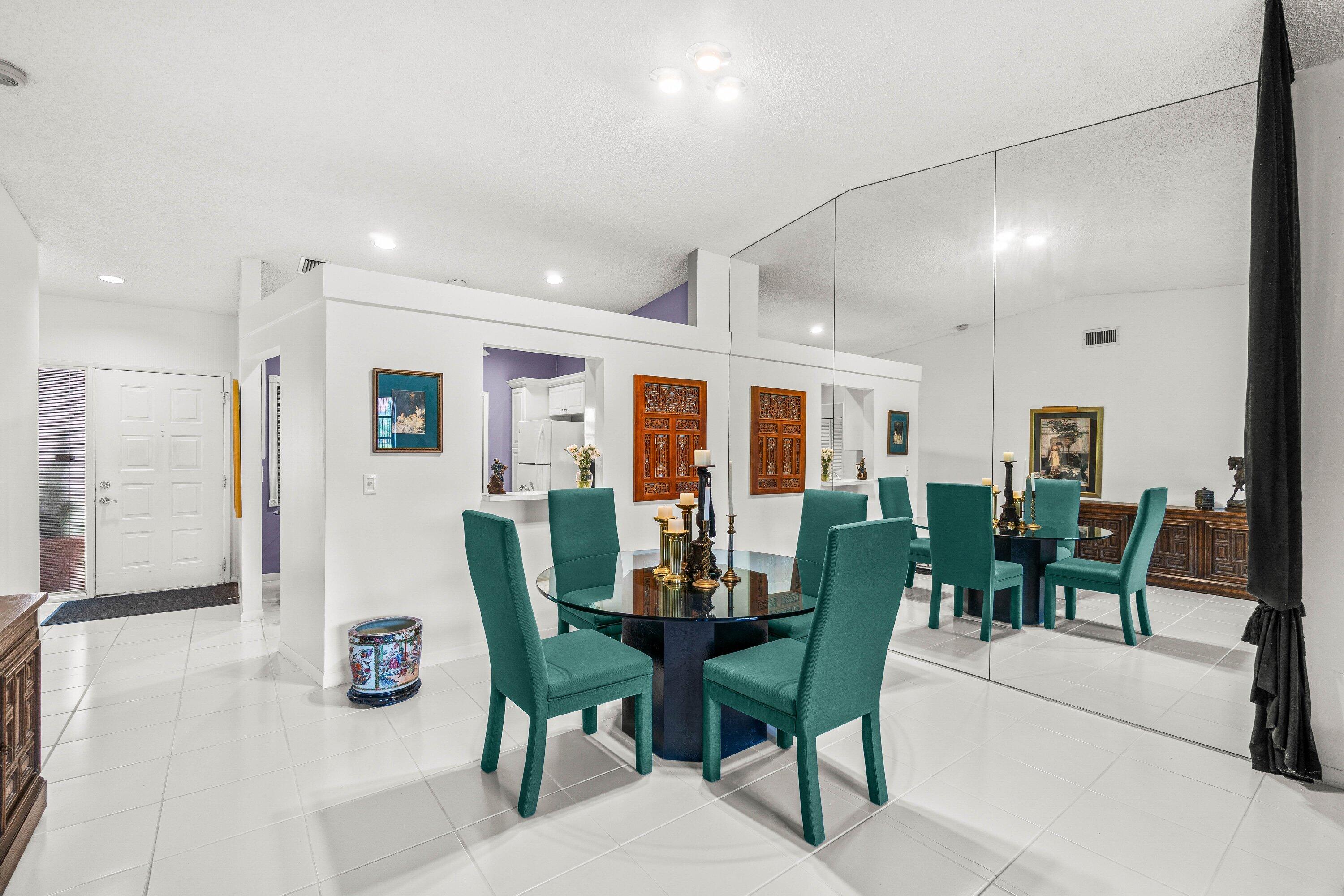 8191 Whispering Palm Drive Boca Raton, FL 33496 - Photo 5 of 34 a view of a dining room with furniture