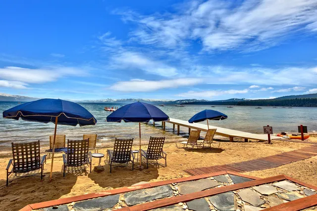 a view of a swimming pool with an outdoor seating
