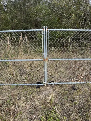 a view of a wooden fence