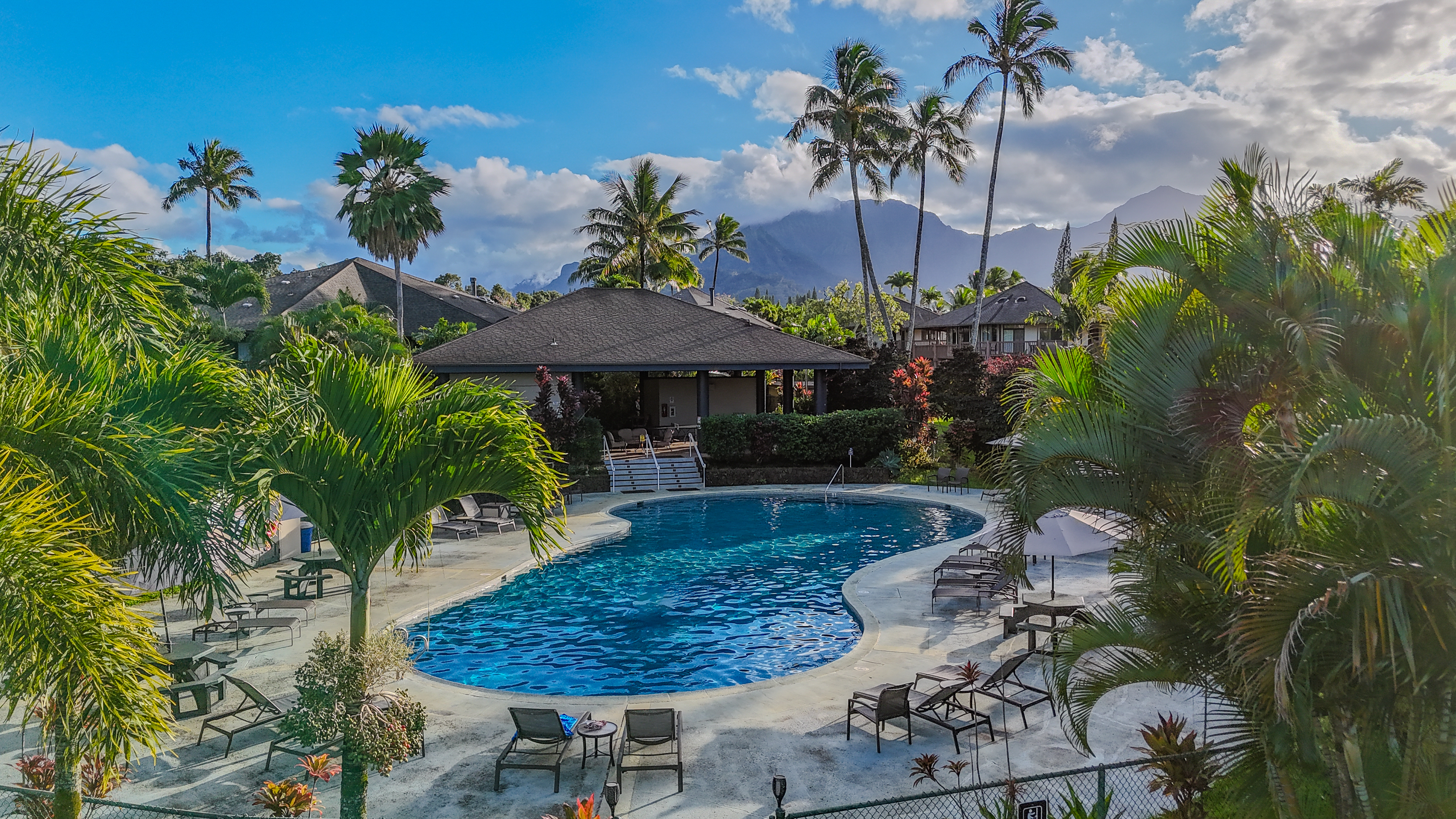 3920 Wyllie Road, Unit 7B Princeville, HI 96722 - Photo 17 of 17 a view of a chairs and table in the patio