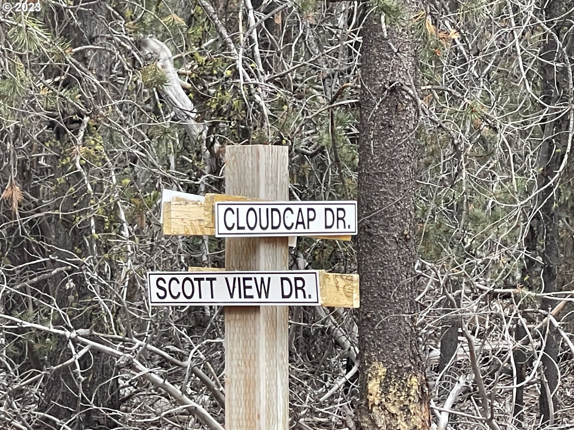 Cloudcap Drive, Unit 15 Chiloquin, OR 97624 - Photo 6 of 17 a street sign on a pole