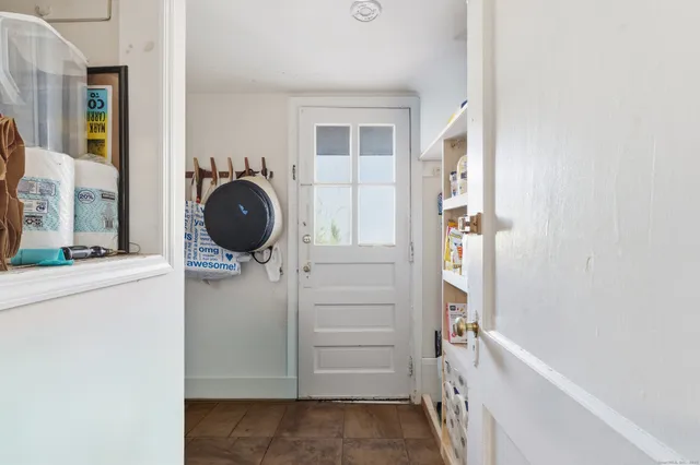 a view of a storage and utility room