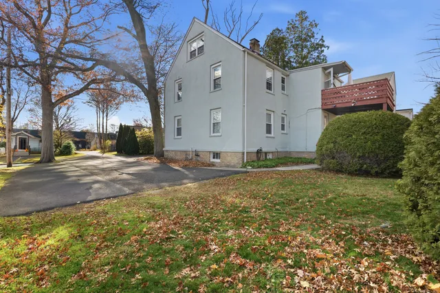 a house with trees in front of it