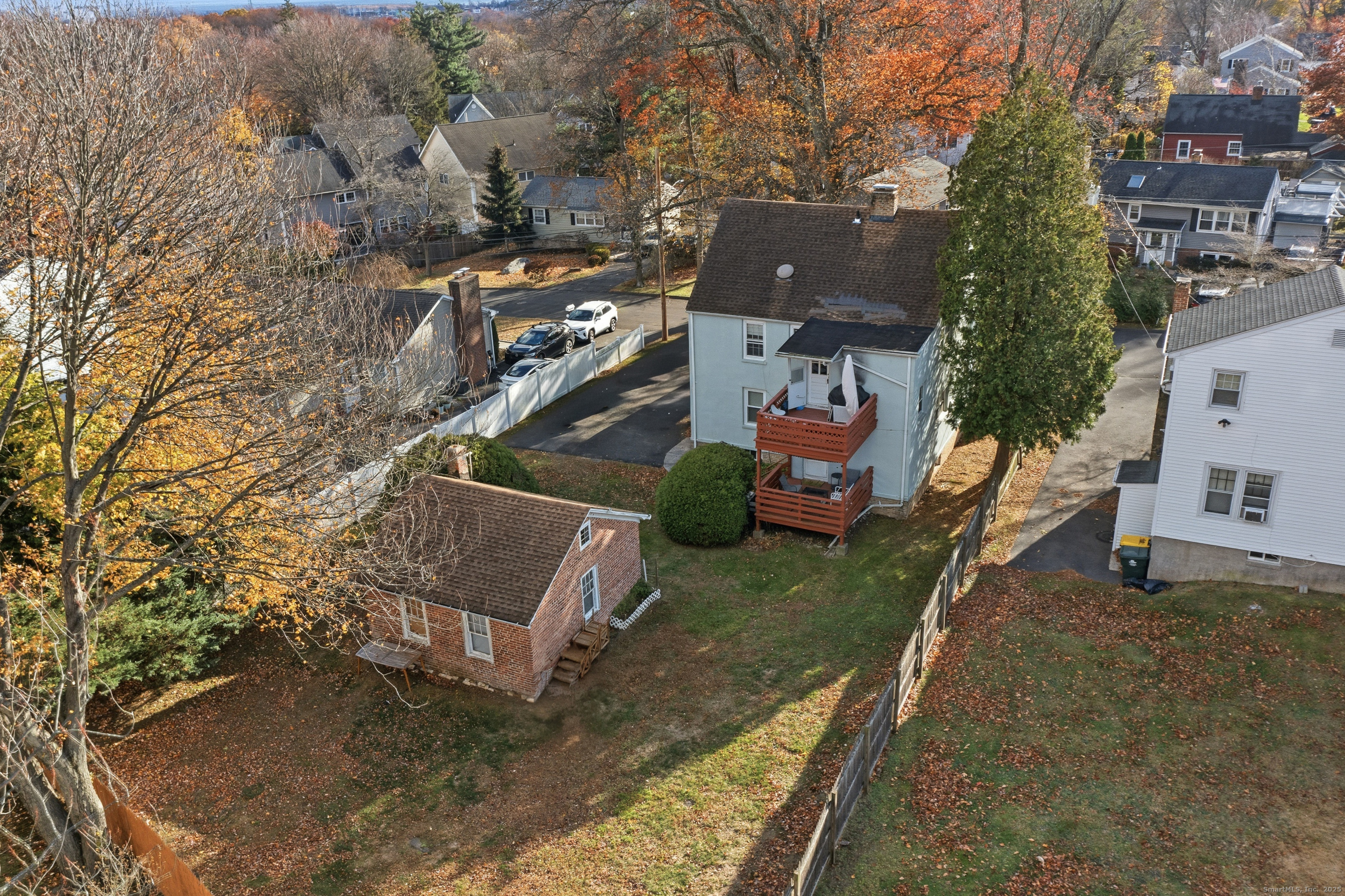144 Warsaw Street Fairfield, CT 06825 - Photo 5 of 39 an aerial view of a house with a yard basket ball court and outdoor seating