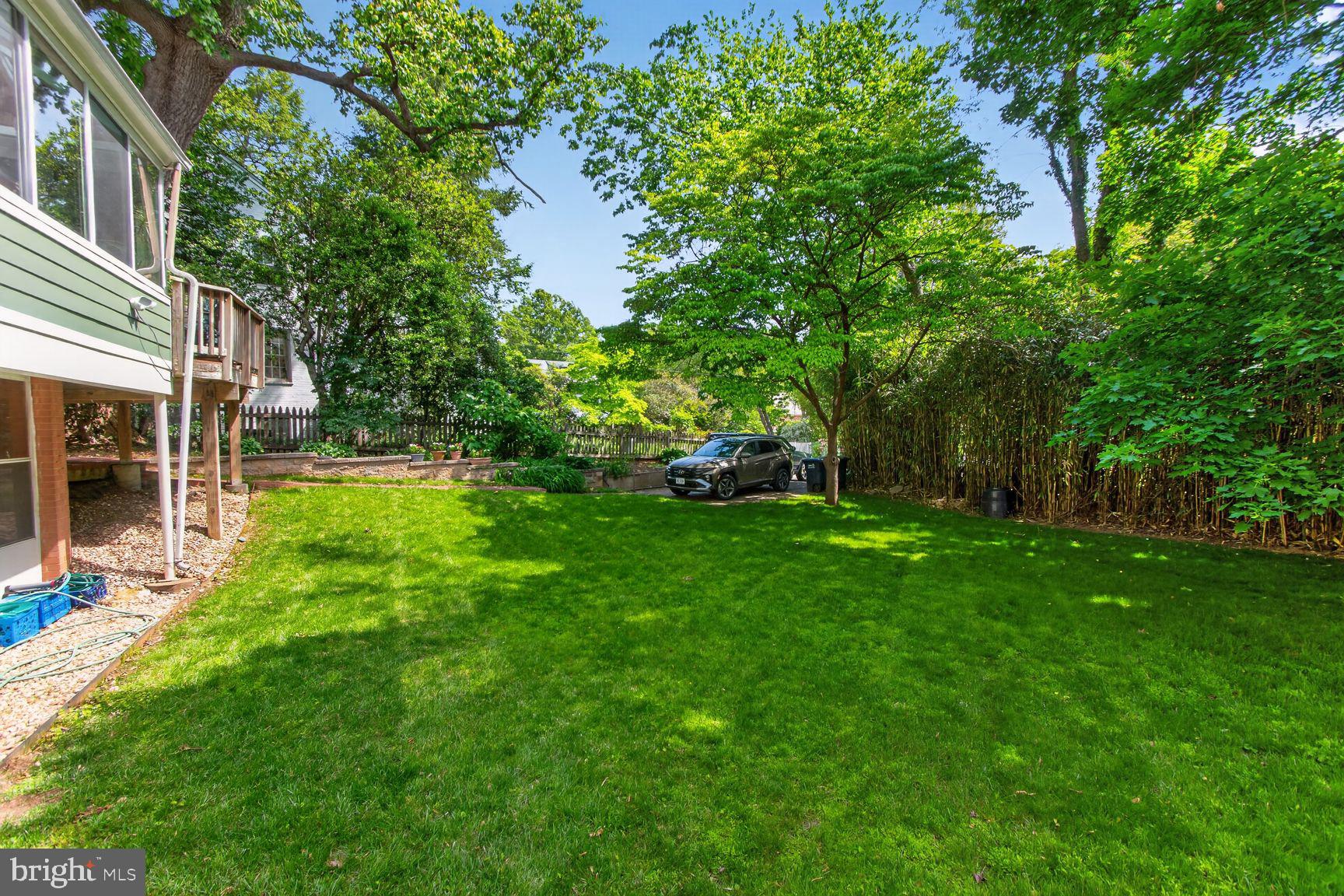 4605 Reno Road Northwest Washington, DC 20008 - Photo 49 of 49 a view of a backyard with a garden