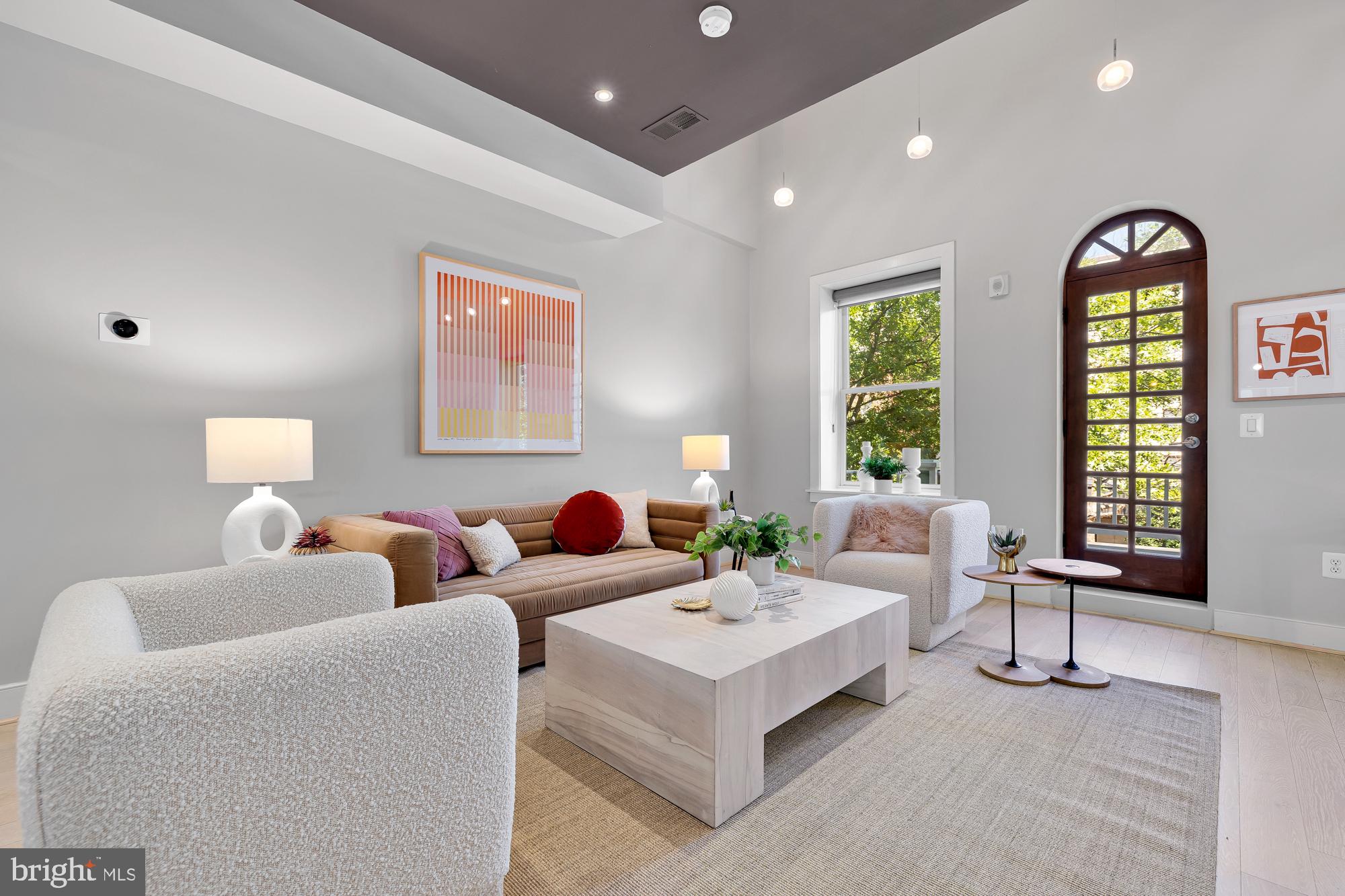 2142 O Street Northwest, Unit 900 Washington, DC 20037 - Photo 6 of 36 Living room leads to balcony