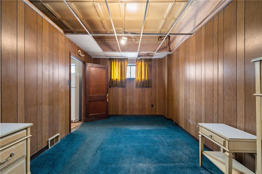 200 Helen Street McKees Rocks, PA 15136 - Photo 15 of 23 a view of an empty room with wooden floor