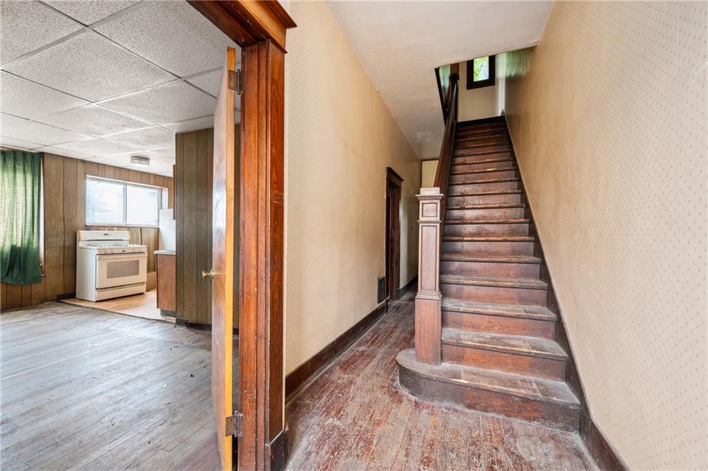 200 Helen Street McKees Rocks, PA 15136 - Photo 4 of 23 a view of a hallway with wooden floor and entryway