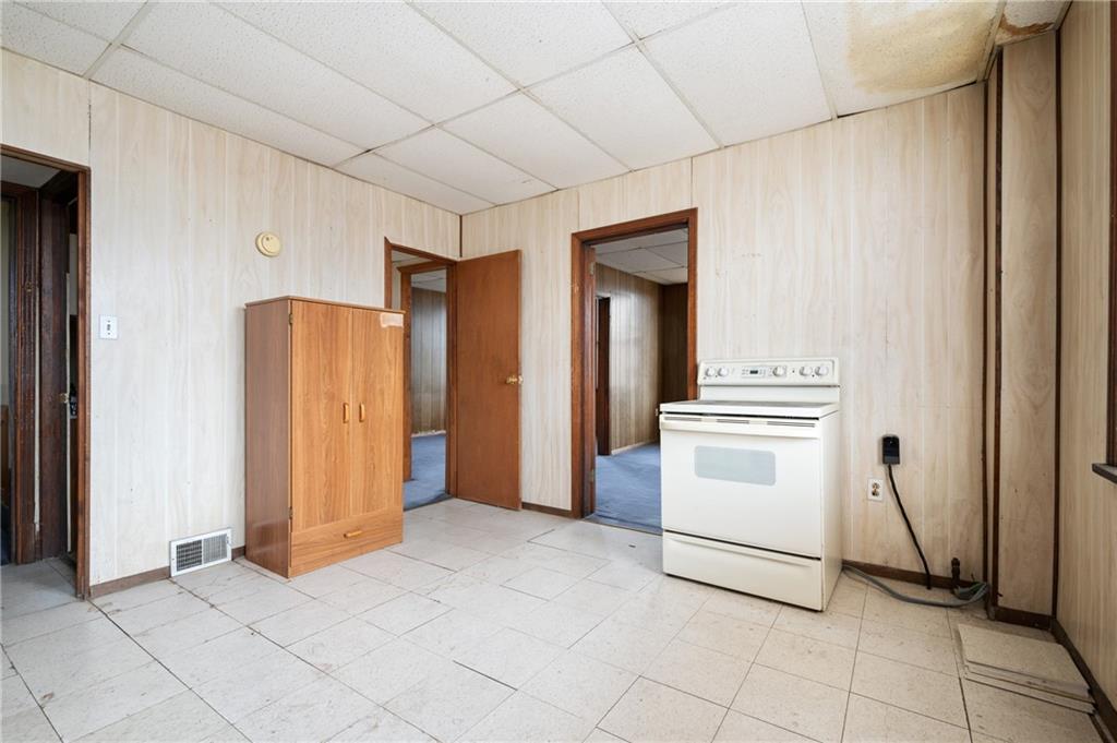 200 Helen Street McKees Rocks, PA 15136 - Photo 7 of 23 a view of a kitchen with refrigerator and dryer