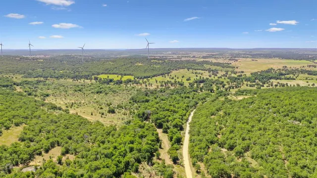 a view of a city with an ocean