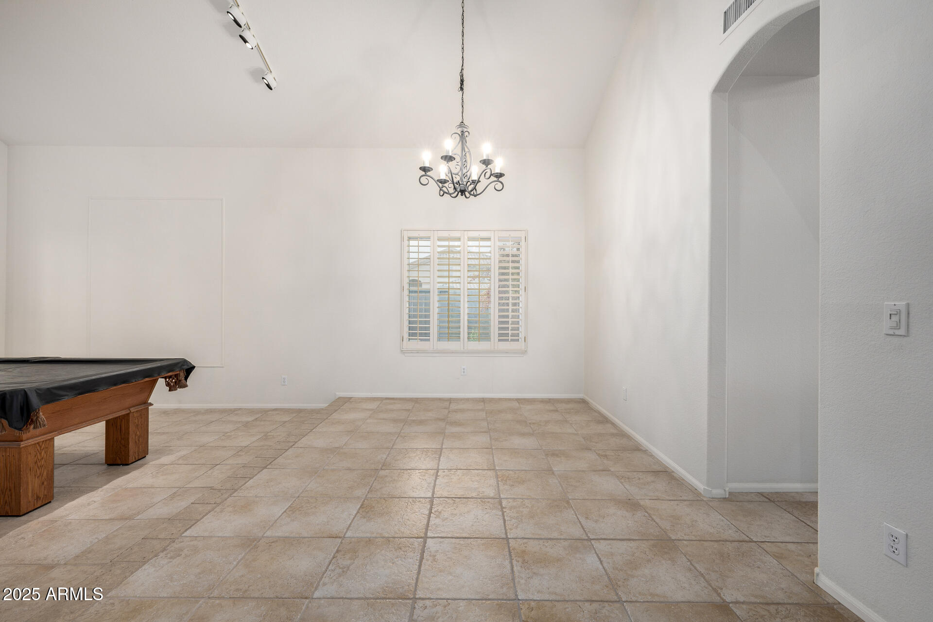 6726 East Villeroy Circle Mesa, AZ 85215 - Photo 18 of 74 a view of an empty room with a window
