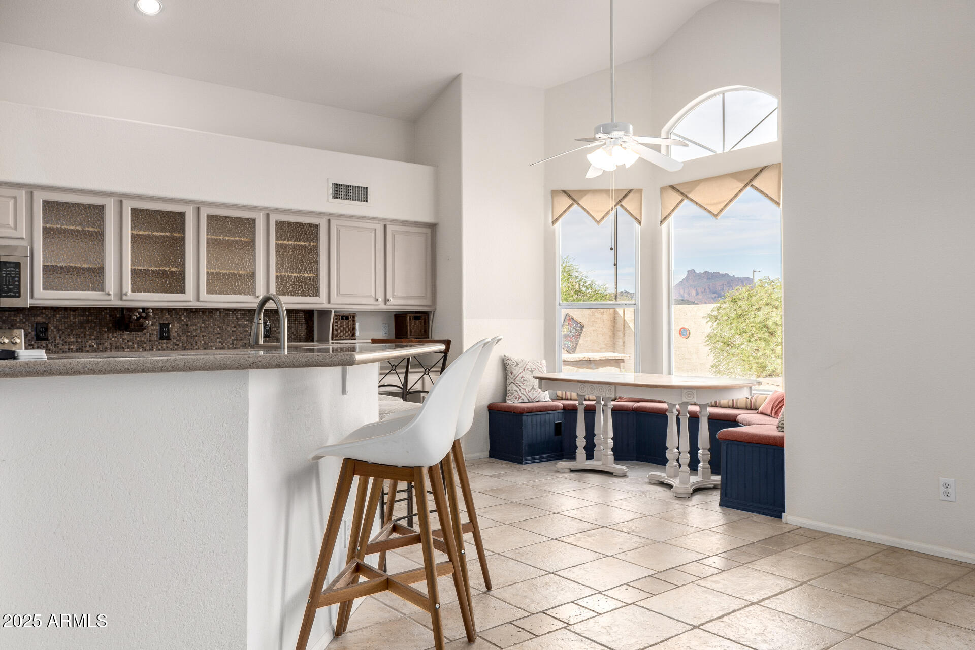 6726 East Villeroy Circle Mesa, AZ 85215 - Photo 22 of 74 a view of a dining room with furniture window and outside view