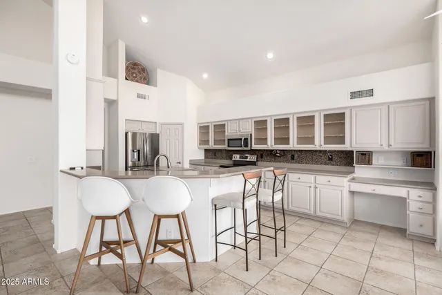 a bath room with a toilet and a bath tub