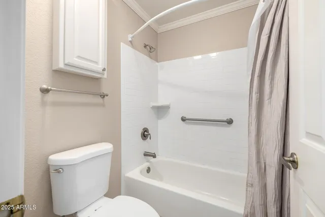 a view of room with window and hardwood floor