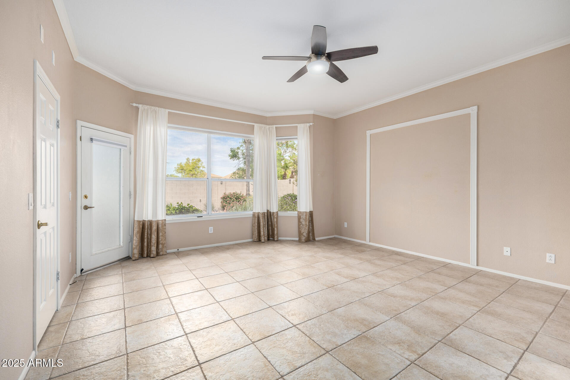 6726 East Villeroy Circle Mesa, AZ 85215 - Photo 37 of 74 a view of an empty room with a window