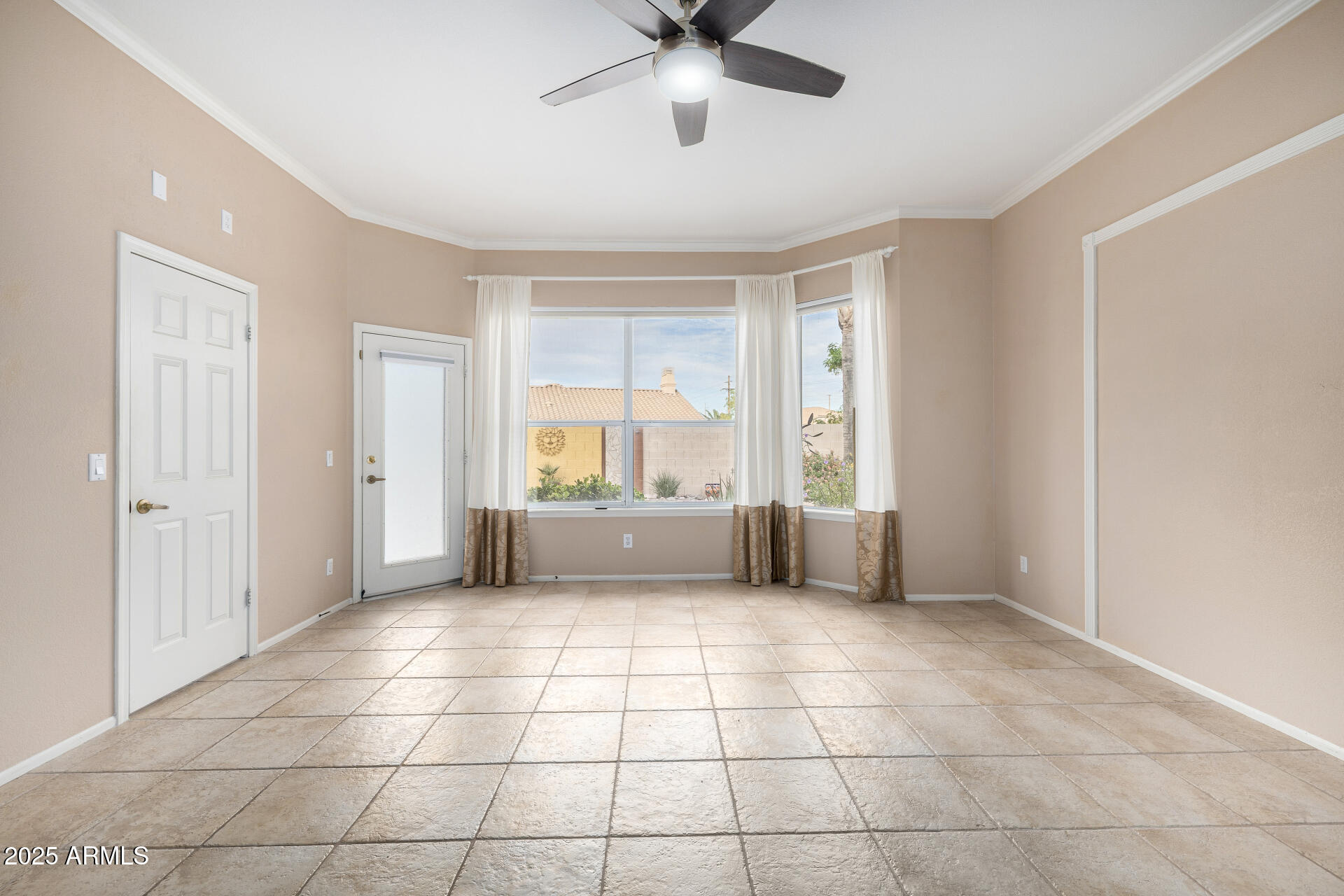 6726 East Villeroy Circle Mesa, AZ 85215 - Photo 38 of 74 a view of an empty room with a window