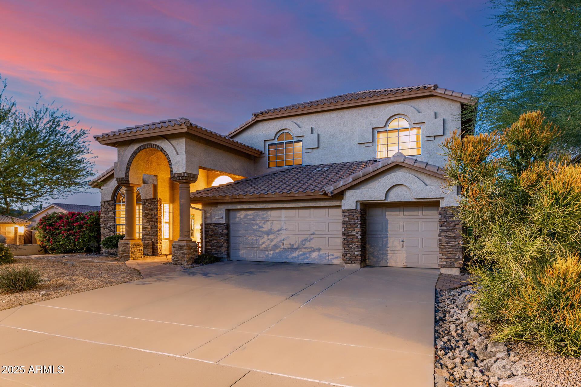 6726 East Villeroy Circle Mesa, AZ 85215 - Photo 4 of 74 a front view of a house with a yard