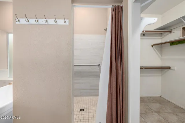 a view of a swimming pool with a yard