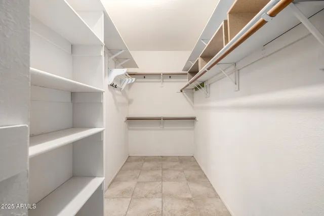 a view of a balcony with chairs