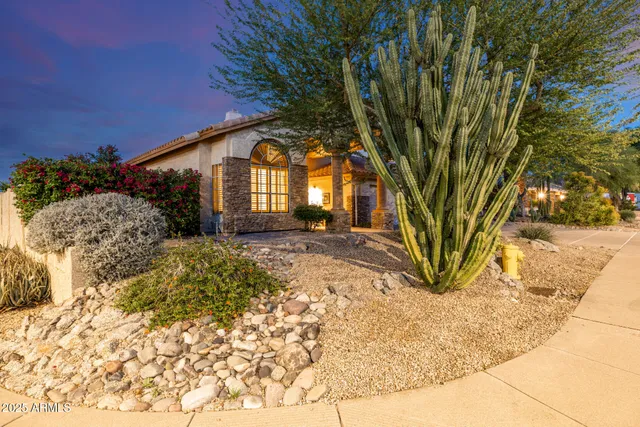 a front view of a house with a garage