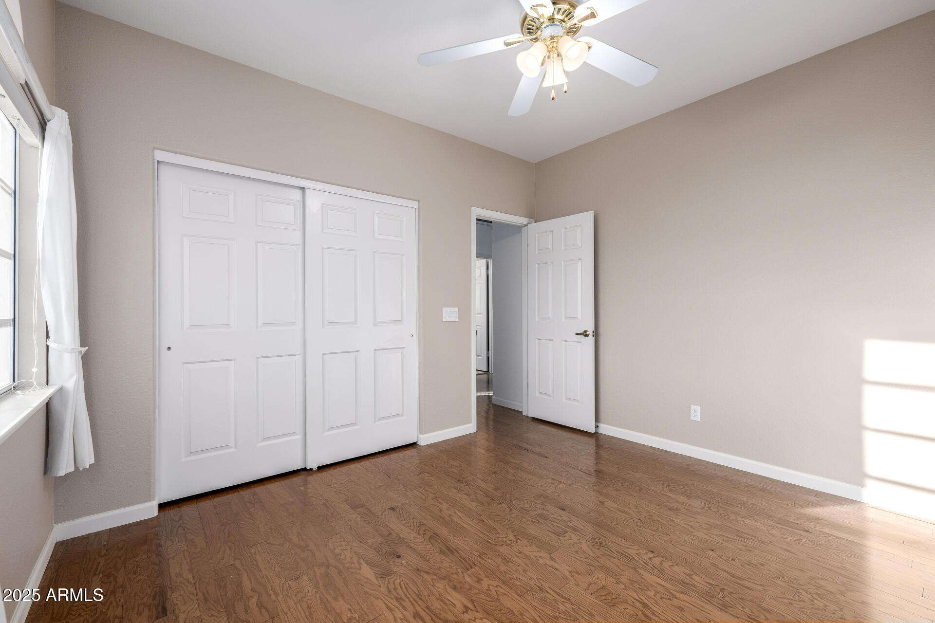 6726 East Villeroy Circle Mesa, AZ 85215 - Photo 53 of 74 an empty room with fan and windows