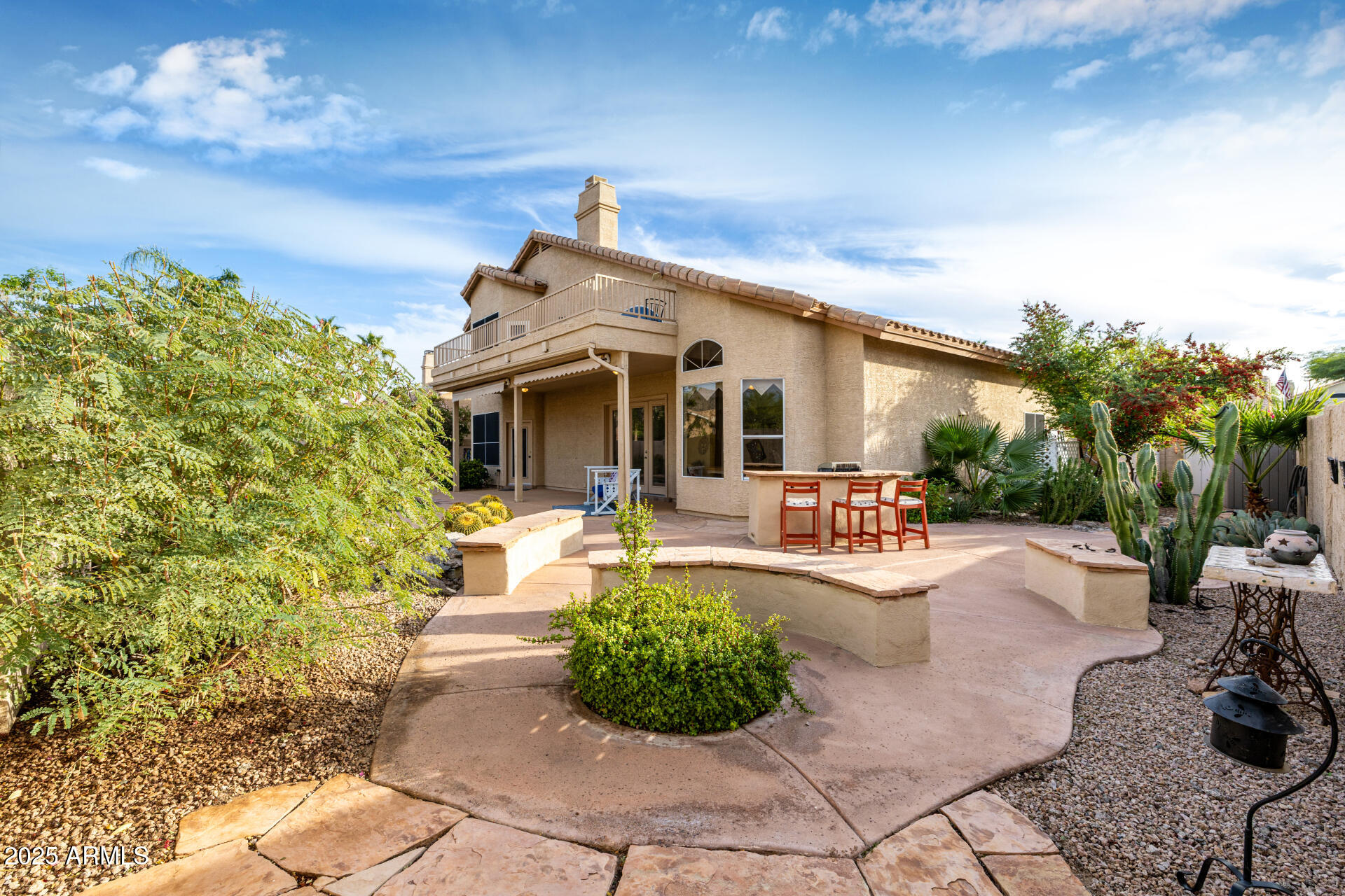 6726 East Villeroy Circle Mesa, AZ 85215 - Photo 69 of 74 a front view of a house with garden