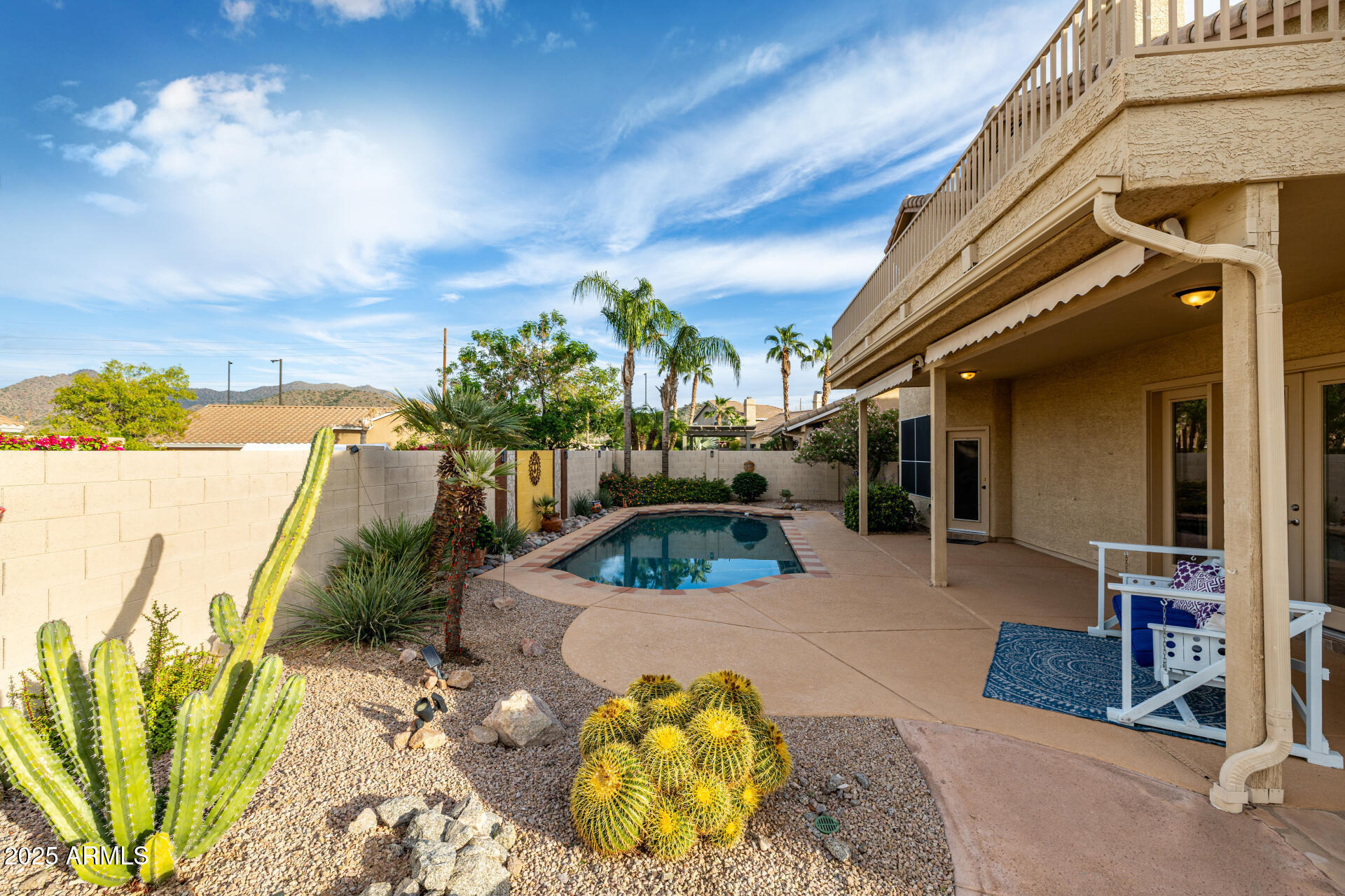 6726 East Villeroy Circle Mesa, AZ 85215 - Photo 70 of 74 a view of a swimming pool with a patio