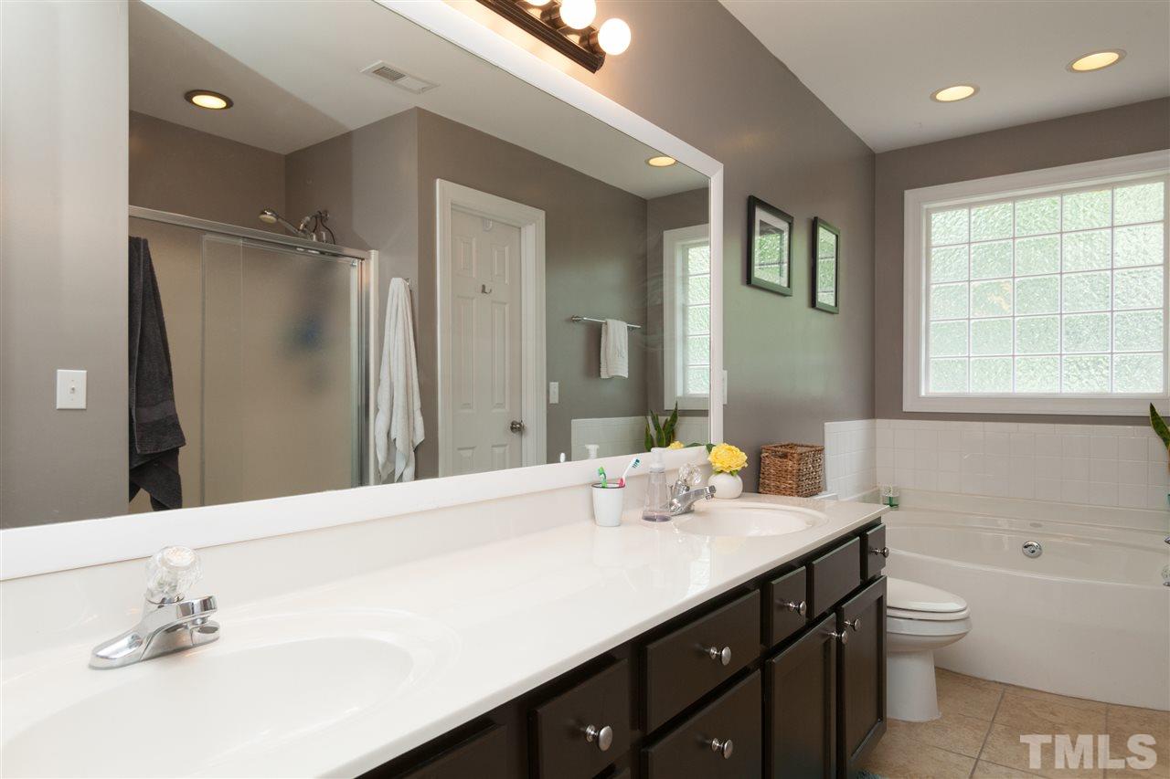 1005 Scotts Ridge Trail Apex, NC 27502 - Photo 15 of 25 Soaking Tub, Large Separate Shower, Large Walk-in Closet