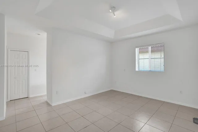 a bathroom with a double vanity sink mirror and