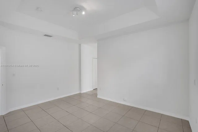 a bathroom with a bathtub and window