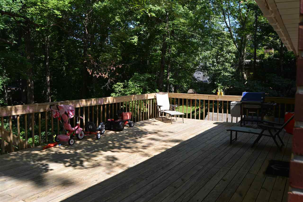 3123 Childers Street Raleigh, NC 27612 - Photo 23 of 25 Large open deck looking out over the lovely wooded lot. Deck