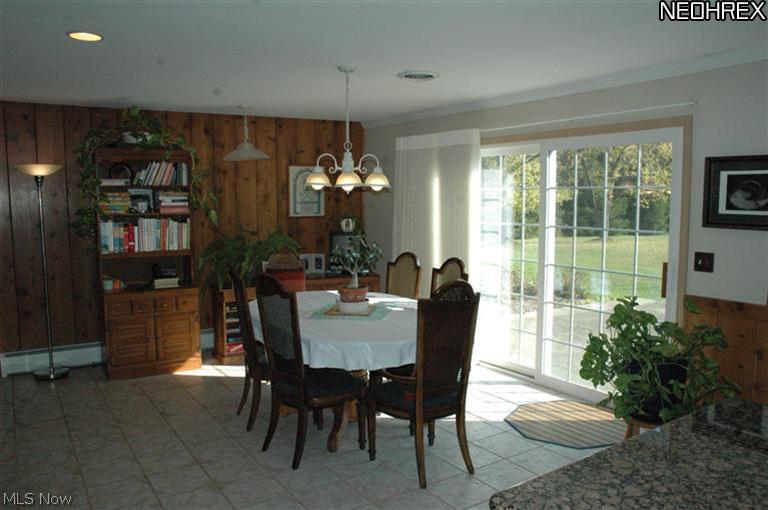 7541 Fairmount Road Novelty, OH 44072 - Photo 5 of 14 Generous eat in kitchen with large sliding glass door to patio.