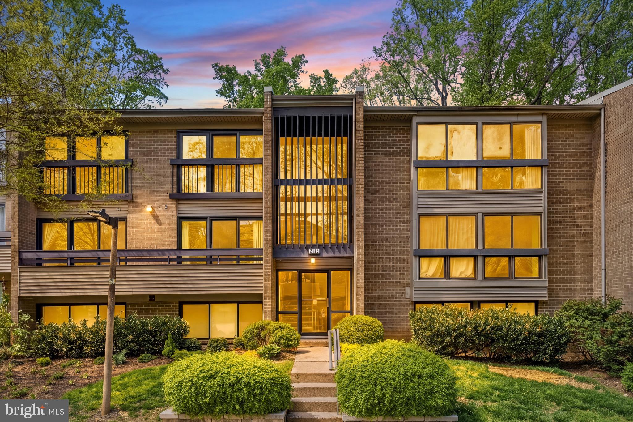 2116 Green Watch Way, Unit 200D Reston, VA 20191 - Photo 2 of 36 Front of building with outside reserved space