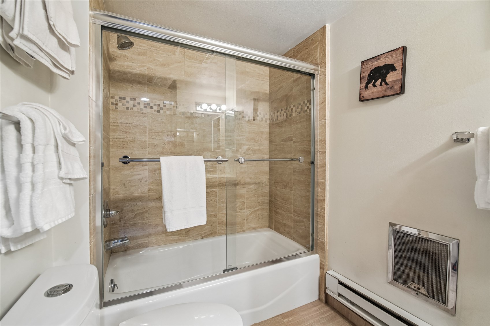 423 Wild Irishman Road, Unit 1008 1009 Keystone, CO 80435 - Photo 16 of 28 a bath tub sitting next to a shower