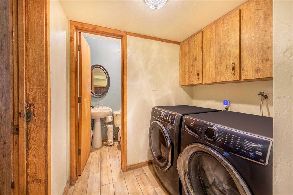 1646 Tyner Road Haines City, FL 33844 - Photo 19 of 64 a utility room with dryer and washer