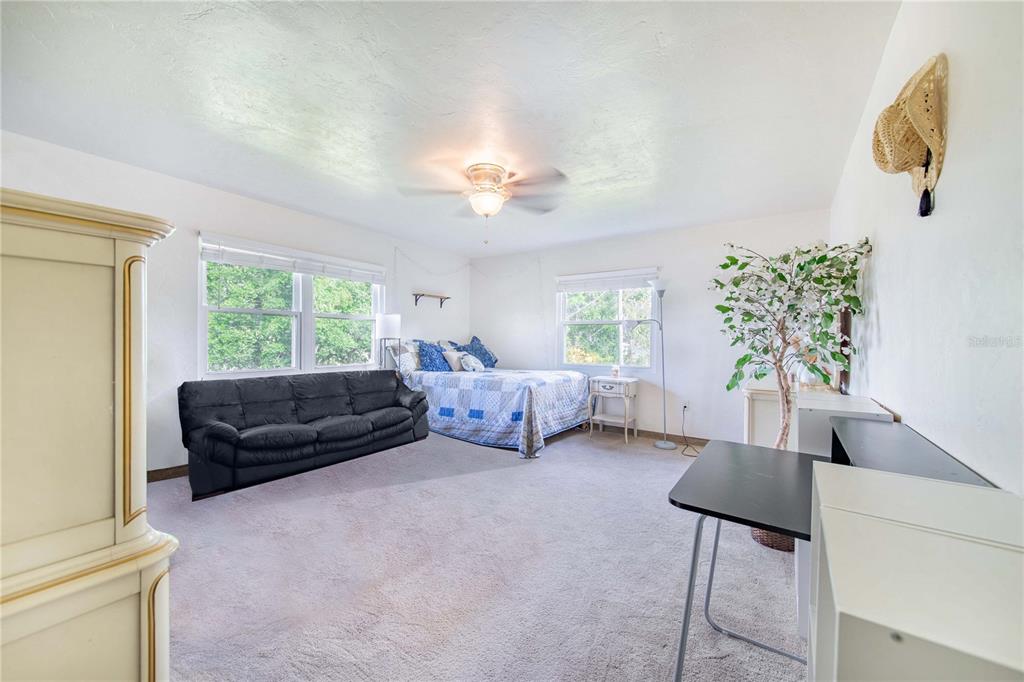 1646 Tyner Road Haines City, FL 33844 - Photo 27 of 64 a living room with furniture and a window