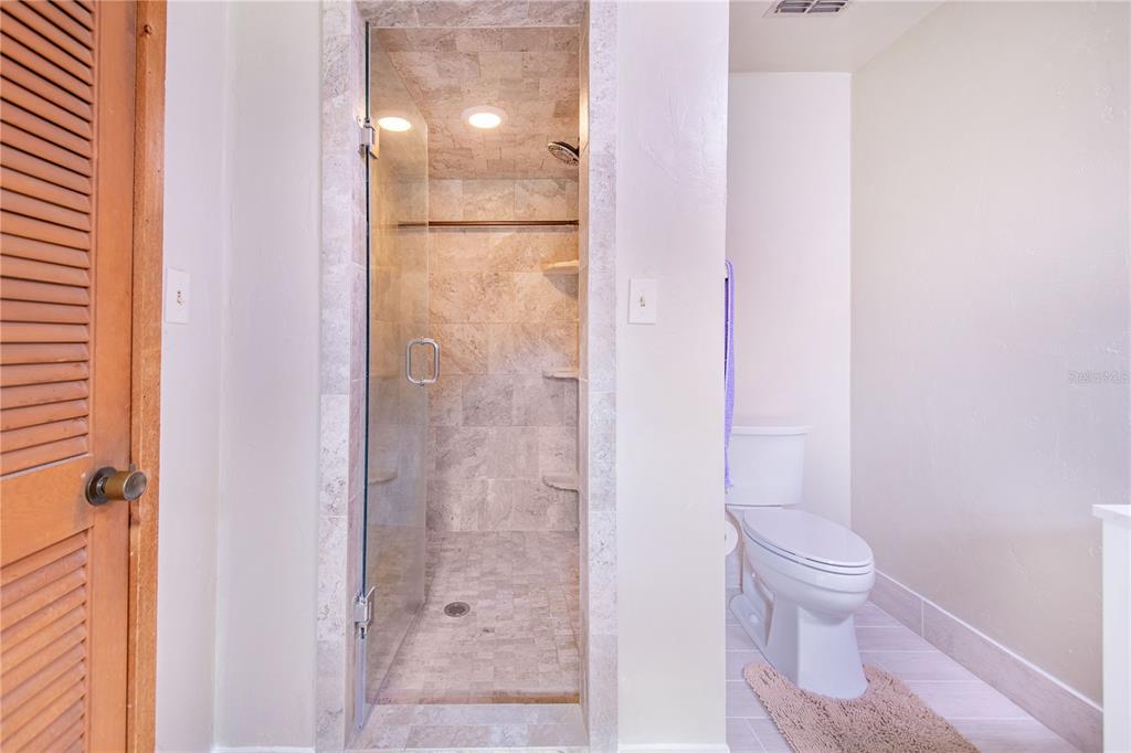 1646 Tyner Road Haines City, FL 33844 - Photo 36 of 64 a bathroom with a shower and a toilet