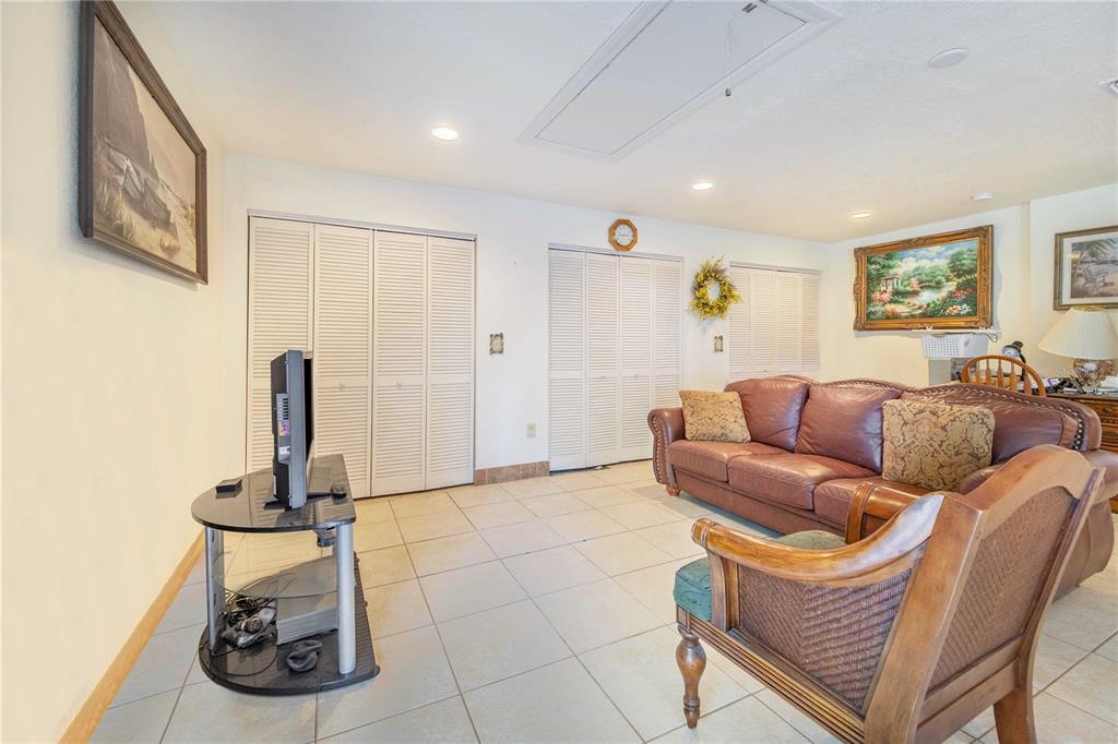 1646 Tyner Road Haines City, FL 33844 - Photo 38 of 64 a living room with furniture a couch and a window