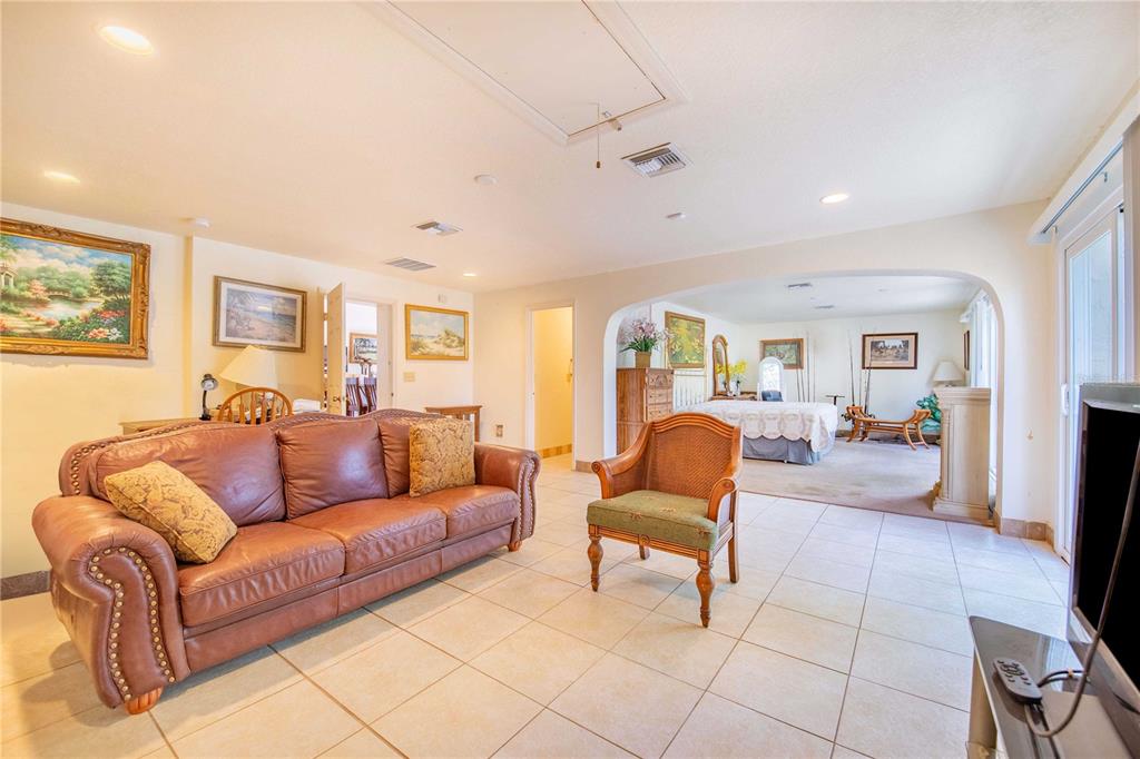 1646 Tyner Road Haines City, FL 33844 - Photo 39 of 64 a living room with furniture and a couch