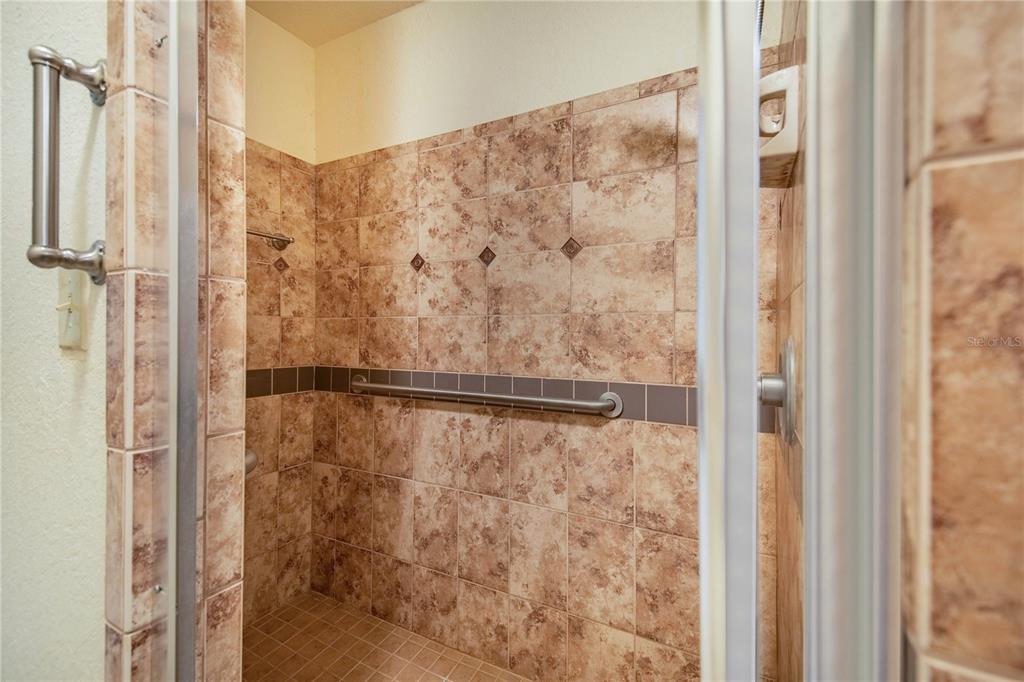 1646 Tyner Road Haines City, FL 33844 - Photo 41 of 64 a bathroom with a shower