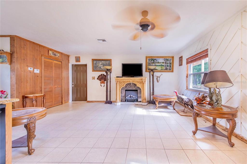 1646 Tyner Road Haines City, FL 33844 - Photo 47 of 64 a view of a livingroom with furniture and a flat screen tv